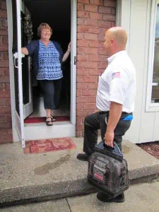 Brad arrival at door of home