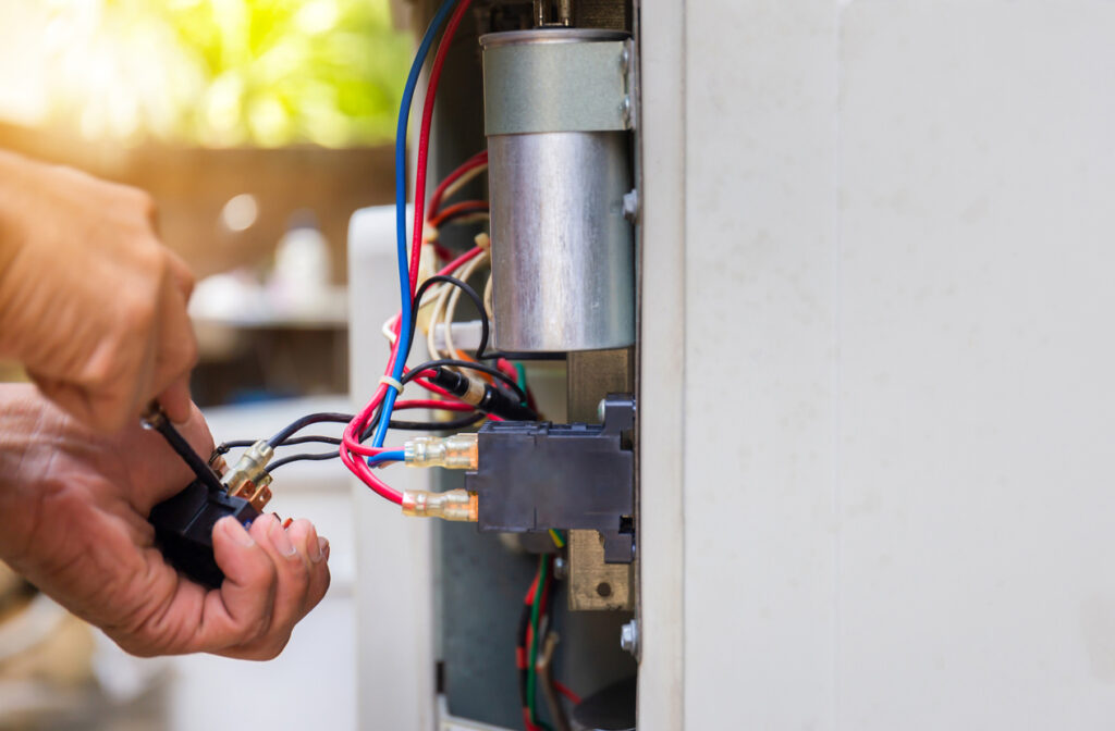 Tech performing electrical work